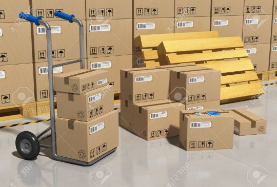 12608739-Interior-of-storage-warehouse-with-goods-packaged-in-cardboard-boxes-and-hand-truck-Stock-Photo